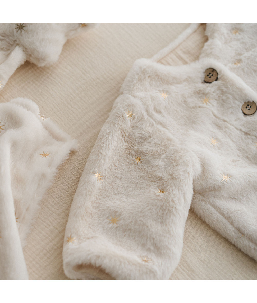 Tela de peluche suave con estrellas doradas